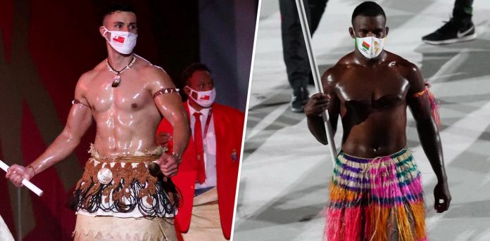 Tonga’s shirtless flag bearer meets his Vanuatu rival – sending twitter fans into frenzy