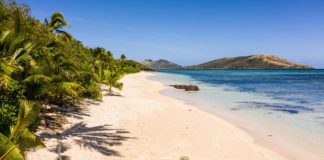 Fiji with highest COVID infection rate aims to have Australians back within months