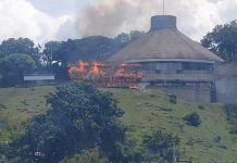Parliament building and police station burned down during protests in Solomon Islands