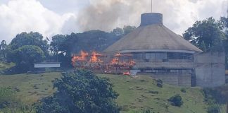 Parliament building and police station burned down during protests in Solomon Islands
