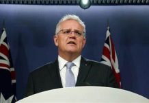 Australia sends troops and police to Solomon Islands as unrest grows