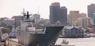 COVID-19 outbreak on board HMAS Adelaide could hold up delivery of vital aid to Tonga