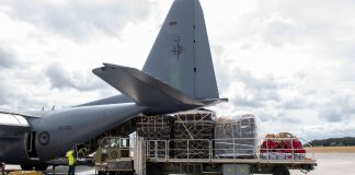 Tonga turns back aid flight from Australia after positive Covid case discovered