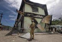 Australia rejects claim its security forces in Solomon Islands were told not to protect Chinese-built buildings