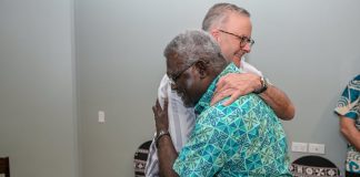 PM Albanese hugs Solomon Islands PM and preaches positivity at Pacific Islands Forum in Fiji