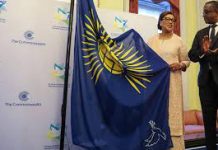 Commonwealth Secretary-General raises Peace Flag to mark Commonwealth Day
