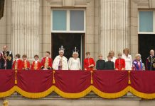 King Charles III crowned with regal pomp, cheers and shrugs