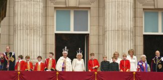 King Charles III crowned with regal pomp, cheers and shrugs