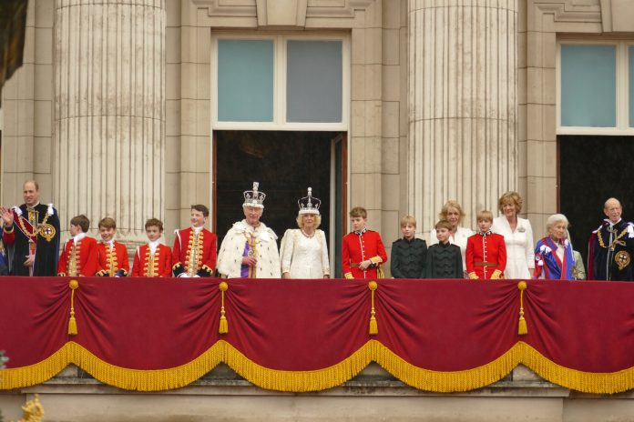 King Charles III crowned with regal pomp, cheers and shrugs