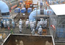 Fukushima nuclear plant operator says equipment to release treated wastewater into sea is complete