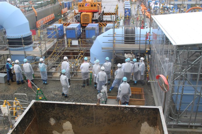 Fukushima nuclear plant operator says equipment to release treated wastewater into sea is complete