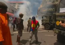 Clashes between pro-independence protesters, police as three French ministers visit New Caledonia