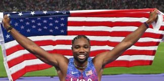 Lyles wins Olympic 100m gold in closest finish in modern history
