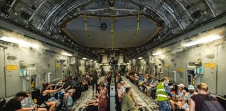 Fist bumps as more than 130 Australians arrive home safe after surviving Vanuatu’s worst earthquake in 100 years