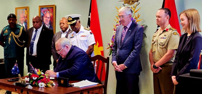 Foreign Minister Tkatchenko certifies PNG-Australia defence treaty
