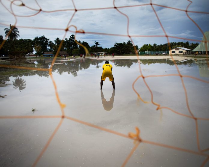 This may be our last chance’: rising sea levels threaten Kiribati’s World Cup dream